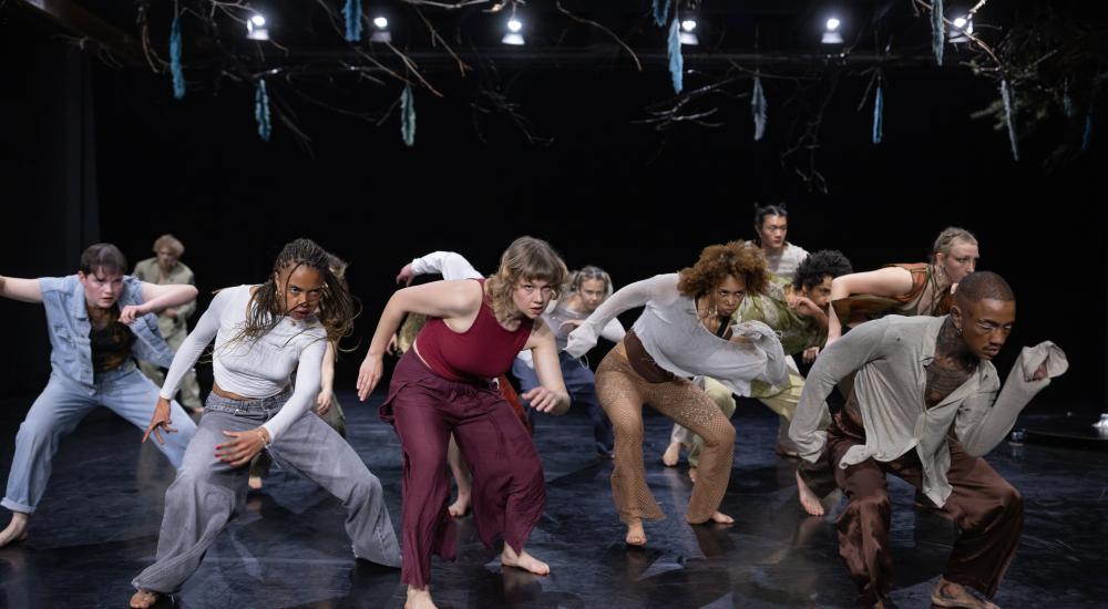 9 performers on stage