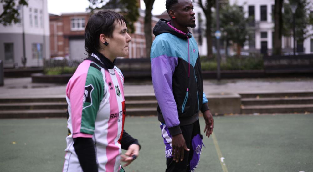 Two football players on a field