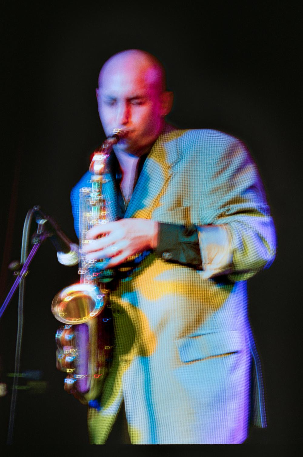 Kid Fourteen playing sax