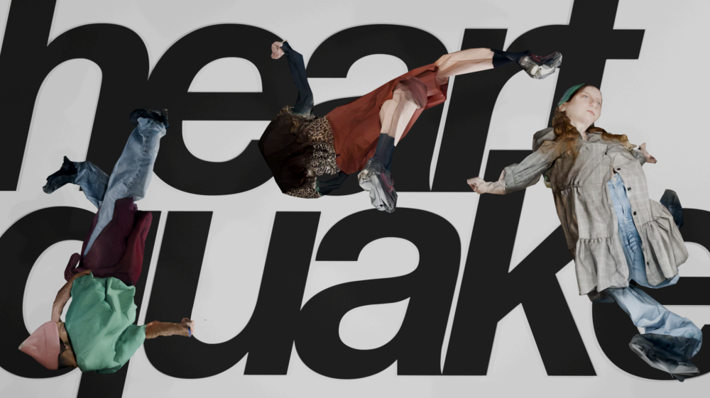 Three human-looking bodysuits on top of the word "heartquake"