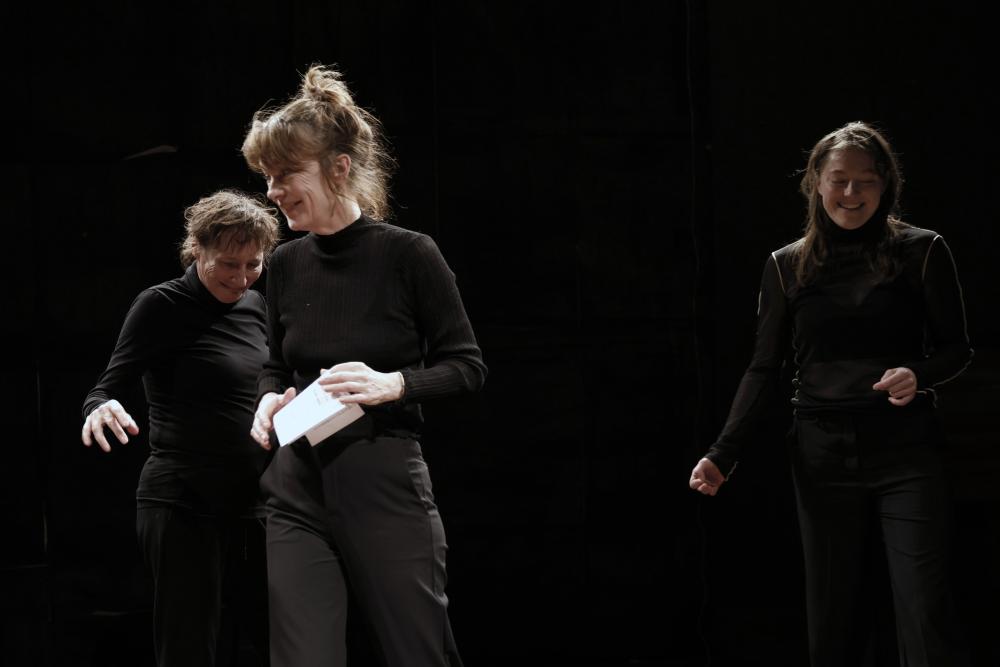 Three women on stage