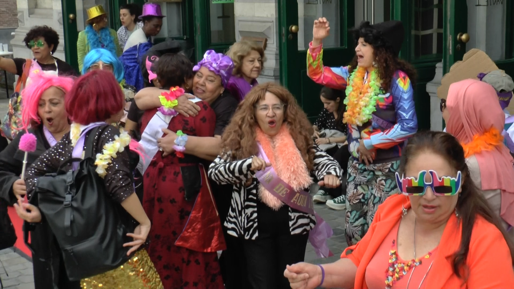 A group of domestic workers dressed in carnivalesque clothing