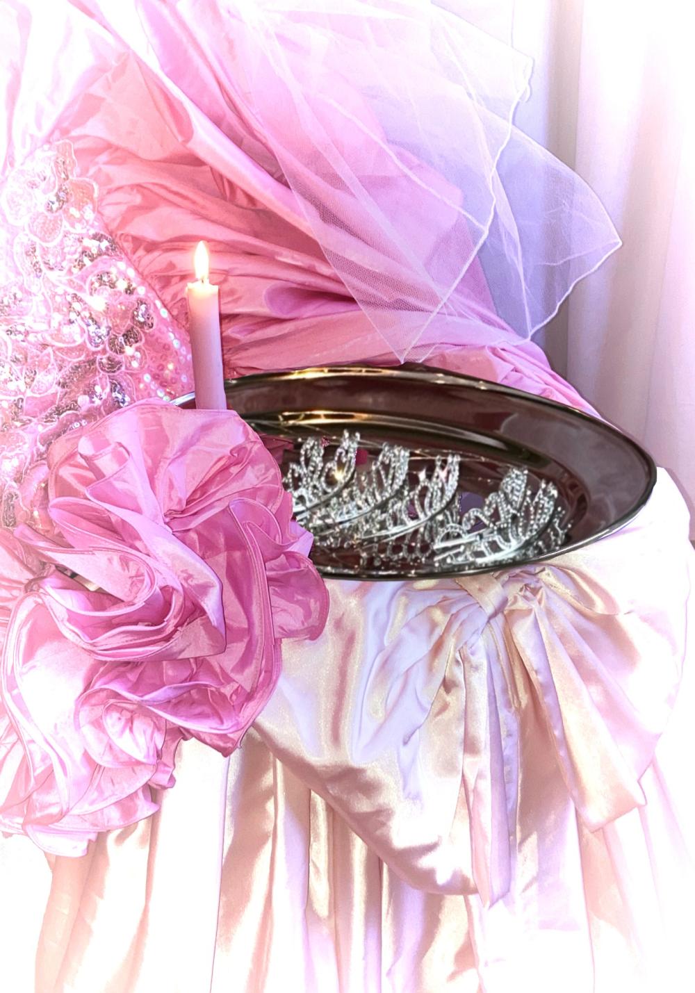 small candle on a plate on dresses