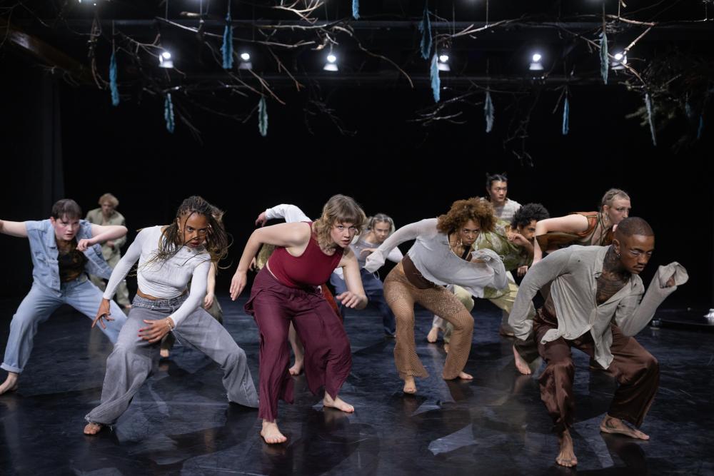 9 performers on stage