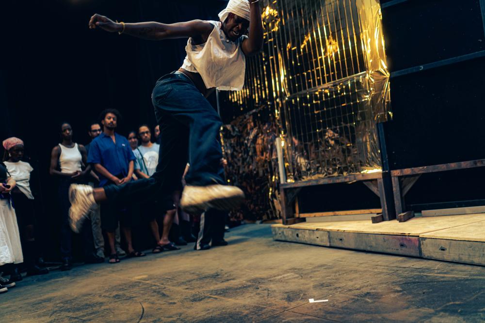 A performer mid-jump