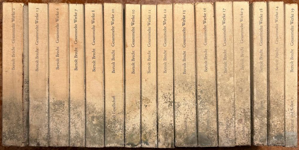 Series of books with mold on them 