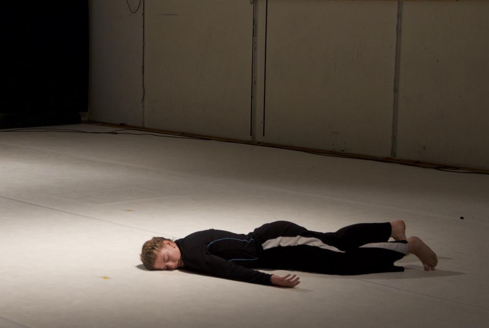 A person lying on their front