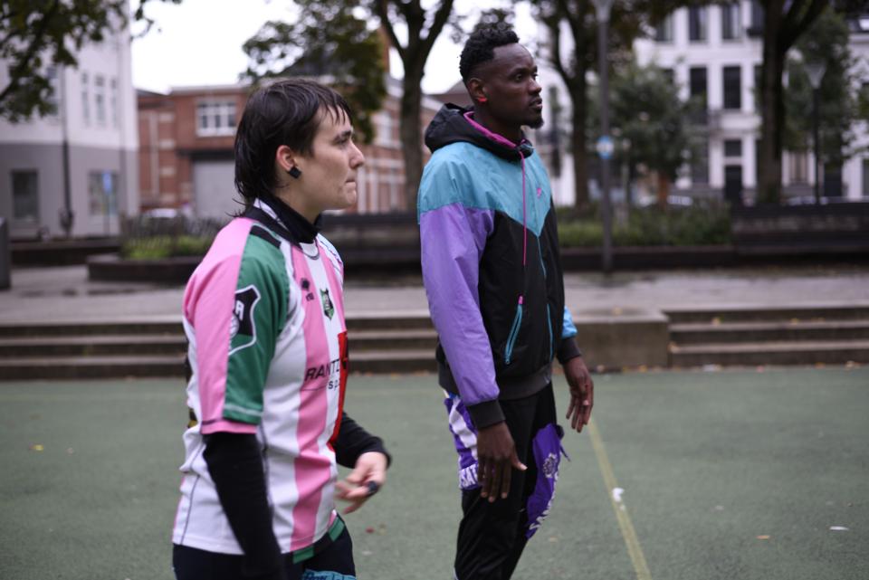Two football players on a field
